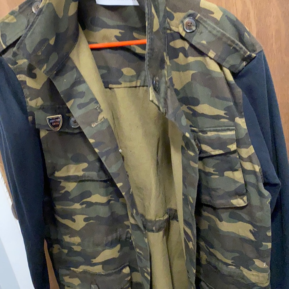 Women’s camo jacket with pins